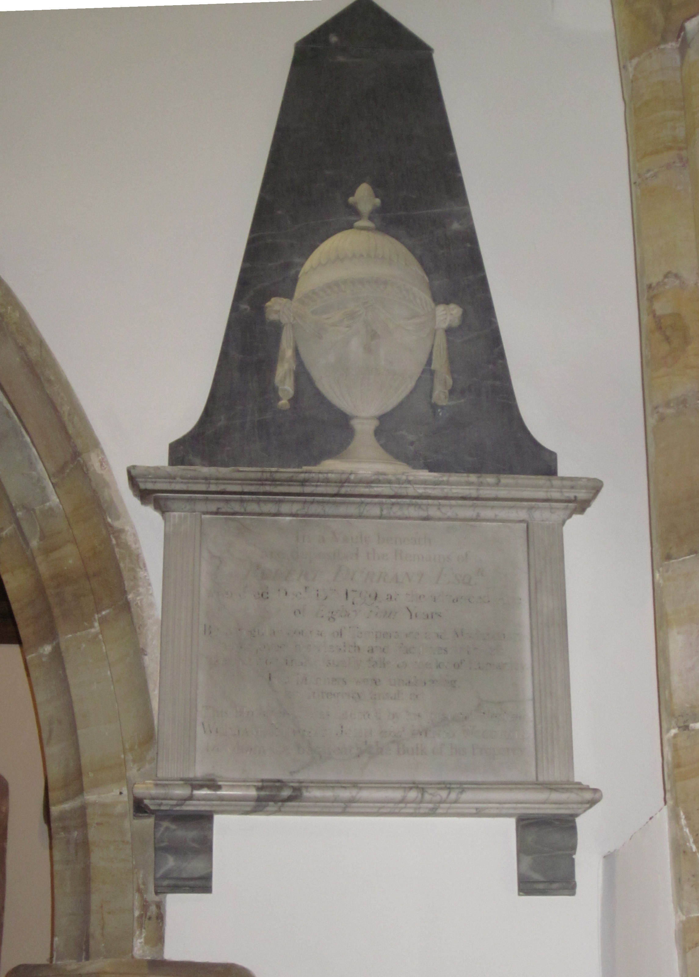 In a vault beneath are deposited the Remains of Robert Durrant, Esq., who died December 13th, 1799, at the advanced age of 84 years. By a regular course of temperance and moderation, he enjoyed his health and faculties with less interruption than usually falls to the lot of humanity.
His manners were unassuming ; his integrity unsullied. This monument was erected by his grateful nephews William, Thomas, John, and Henry Woodward, to whom he bequeathed the bulk of his property.
